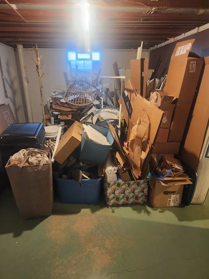 Roll-off dumpster container at job site for 2 Yard Dumpster Rental in Greece